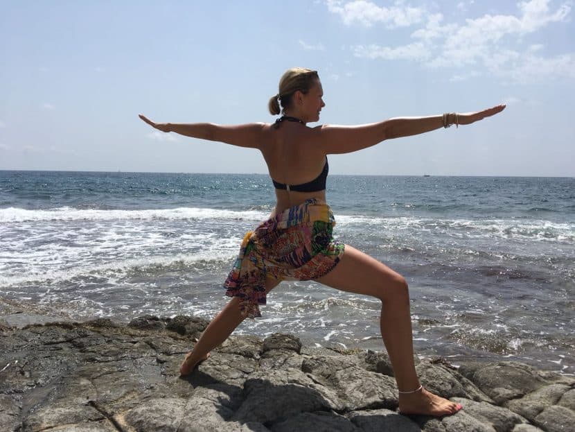 shape up for summer image of tabitha yoga woman in warrior 2 pose