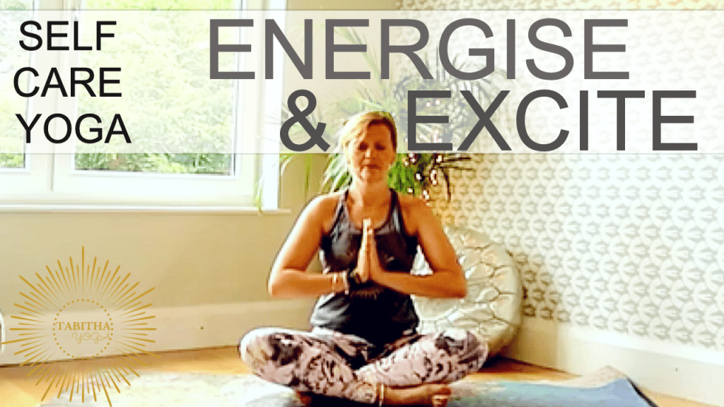 Tabitha Yoga sitting in namaste position cover image for Self Care Yoga Energise & Excite video class